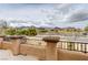 Balcony view overlooking landscaped grounds and mountains on the horizon at 12116 Vista Linda Ave, Las Vegas, NV 89138