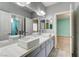 Bathroom featuring double sinks, square basins, and lots of counter space at 12116 Vista Linda Ave, Las Vegas, NV 89138