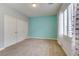 Bedroom with a closet and natural light from the large window at 12116 Vista Linda Ave, Las Vegas, NV 89138