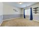 Cozy bedroom with carpet floors, natural light, and charming 'Field of Dreams' decor at 12116 Vista Linda Ave, Las Vegas, NV 89138