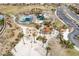 Enjoy the community park amenities, including a playground, picnic spots, and shaded seating areas amid desert landscaping at 12116 Vista Linda Ave, Las Vegas, NV 89138