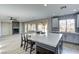 Bright kitchen with a large island, granite countertops, and stainless steel appliances showcasing modern functionality at 12116 Vista Linda Ave, Las Vegas, NV 89138