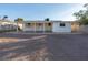 The backyard features a covered patio, providing shade and an outdoor space for relaxation at 1436 Chestnut St, Henderson, NV 89011