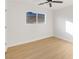 This bright bedroom has a ceiling fan and a window that lets in natural light at 1436 Chestnut St, Henderson, NV 89011
