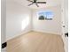 Bright bedroom with luxury vinyl plank flooring and a window with a neighborhood view at 1436 Chestnut St, Henderson, NV 89011