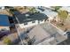 A well-maintained home showcases its roof, windows, yard, and overall curb appeal in a residential setting at 1436 Chestnut St, Henderson, NV 89011