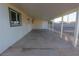 A covered patio offers shaded outdoor living space with access to the backyard and a door to the home's interior at 1436 Chestnut St, Henderson, NV 89011
