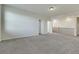Expansive bonus room with plush carpeting and easy access to other rooms at 152 Walkinshaw Ave, Las Vegas, NV 89148