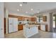 Beautiful kitchen with stainless appliances, granite counters, and island at 152 Walkinshaw Ave, Las Vegas, NV 89148