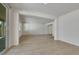 View of tile kitchen and carpeted living space at 152 Walkinshaw Ave, Las Vegas, NV 89148