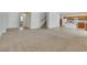 Spacious living room featuring an open floorplan and staircase at 152 Walkinshaw Ave, Las Vegas, NV 89148
