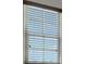 Window with blinds allowing natural light with view of the landscape outdoors at 152 Walkinshaw Ave, Las Vegas, NV 89148