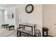 Cozy living room featuring modern furnishings, a dining table, and wall-mounted TV at 1611 Prairie Fields Ct, Las Vegas, NV 89115