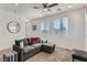 Bright, cozy living room with modern furnishings and lots of natural light at 1611 Prairie Fields Ct, Las Vegas, NV 89115