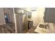 Cozy kitchen featuring stainless steel appliances, gray cabinets, and light countertops at 1624 N Torrey Pines Dr # 101, Las Vegas, NV 89108