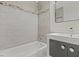 Modern bathroom with a decorative backsplash, modern fixtures, and new vanity at 1628 Izabella Ave, Las Vegas, NV 89169