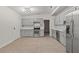 Well-designed kitchen boasts stainless steel appliances, sleek countertops, and ample cabinet space at 1628 Izabella Ave, Las Vegas, NV 89169
