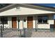 Inviting home exterior featuring a dual entrance and security doors for peace of mind at 1820 Yale St, North Las Vegas, NV 89030