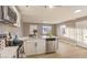 Bright and open kitchen area with stainless steel appliances and ample counter space for meal prep at 1820 Yale St, North Las Vegas, NV 89030