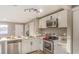 Well-equipped kitchen with stainless steel appliances, perfect for culinary adventures and modern living at 1820 Yale St, North Las Vegas, NV 89030