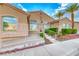 Well-maintained clubhouse entrance with landscaped walkway and modern architecture offers a welcoming community gathering space at 200 Teller St, Henderson, NV 89074