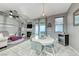 Cozy dining area with a statement light fixture and modern décor at 200 Teller St, Henderson, NV 89074
