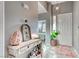 View of the bright and welcoming entryway showcasing stylish decor and tile flooring at 200 Teller St, Henderson, NV 89074