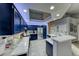 Spacious kitchen with stainless steel appliances and blue cabinetry at 200 Teller St, Henderson, NV 89074