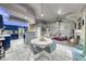 Open-concept living space featuring a modern kitchen, dining area, and comfortable living room at 200 Teller St, Henderson, NV 89074