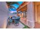 Comfortable covered patio with dining, outdoor kitchen, and ample space for entertaining at 200 Teller St, Henderson, NV 89074