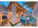 Covered patio with dining area, and a built-in grill at 200 Teller St, Henderson, NV 89074