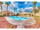 Inviting community pool with plenty of lounge chairs and covered seating areas for relaxing and socializing at 200 Teller St, Henderson, NV 89074
