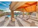Outdoor community space with picnic tables and seating along with a clean pool to cool off in at 200 Teller St, Henderson, NV 89074