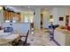 Open-concept living space featuring a view of the kitchen and dining area at 2026 Poppywood Ave, Henderson, NV 89012