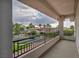Balcony overlooking the neighborhood with lush landscaping and views of other homes at 2058 Troon Dr, Henderson, NV 89074