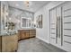 Stylish bathroom featuring dual sinks, modern lighting, marble accents, and a sleek design for a contemporary feel at 2058 Troon Dr, Henderson, NV 89074