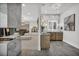 Open-concept bathroom with marble fireplace, dual vanities, and access to the main bedroom creates a luxurious suite at 2058 Troon Dr, Henderson, NV 89074