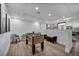 Game room with foosball table, seating, and modern lighting at 2058 Troon Dr, Henderson, NV 89074