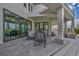 Covered patio featuring comfortable seating and seamless indoor-outdoor living at 2058 Troon Dr, Henderson, NV 89074