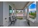 Enjoy views from this home's comfortable outdoor patio with seating and built in BBQ at 2058 Troon Dr, Henderson, NV 89074