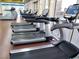 Modern fitness center equipped with treadmills and large display screens at 2331 Galilean Moon St, Henderson, NV 89044