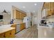 Well-maintained kitchen featuring wood cabinets, tiled floors, and stainless steel appliances at 2331 Galilean Moon St, Henderson, NV 89044