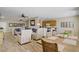 Open-concept living space with views of the living room, kitchen, and backyard dining space at 2331 Galilean Moon St, Henderson, NV 89044