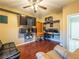 A versatile bonus room featuring hardwood floors, media, and a built-in workstation at 268 Copper Glow Ct, Henderson, NV 89074