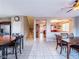 Open dining area with tile floors, a view of the staircase, and access to other living spaces at 268 Copper Glow Ct, Henderson, NV 89074
