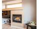 A close-up view of the fireplace with built in shelving, media, and decor at 268 Copper Glow Ct, Henderson, NV 89074