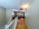 Hallway leading to the living area featuring hardwood floors and neutral paint at 268 Copper Glow Ct, Henderson, NV 89074