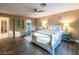 Spacious main bedroom with stylish furniture, shelving, and attached bath at 268 Copper Glow Ct, Henderson, NV 89074