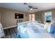 Spacious main bedroom includes TV, ensuite bath, and attached closet at 268 Copper Glow Ct, Henderson, NV 89074