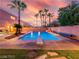 Backyard featuring a swimming pool with a spa, a diving board, and a rock slide at 268 Copper Glow Ct, Henderson, NV 89074